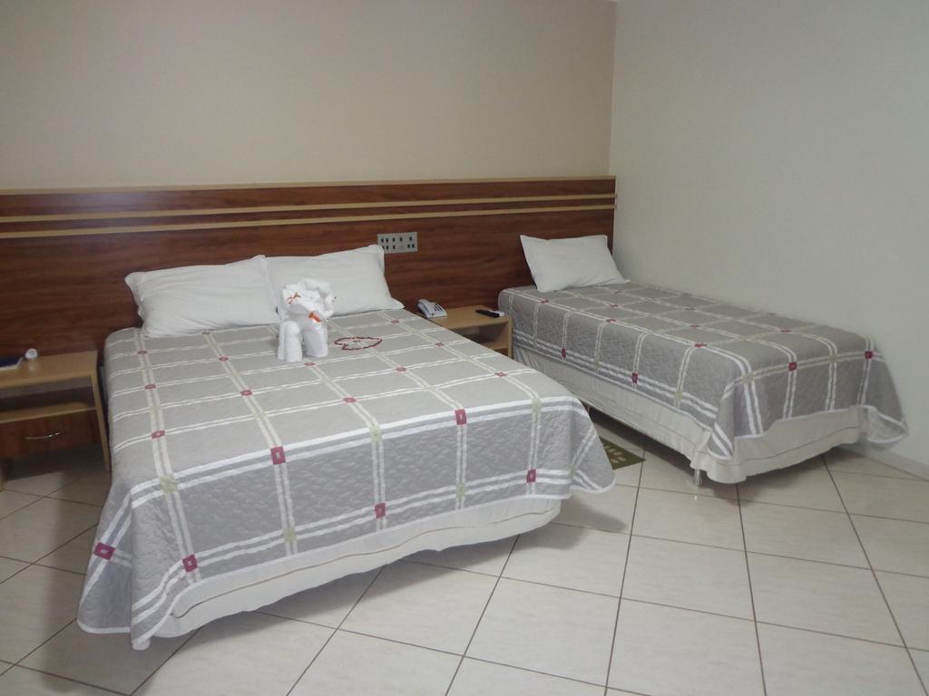 Quarto Triplo Superior com Varanda